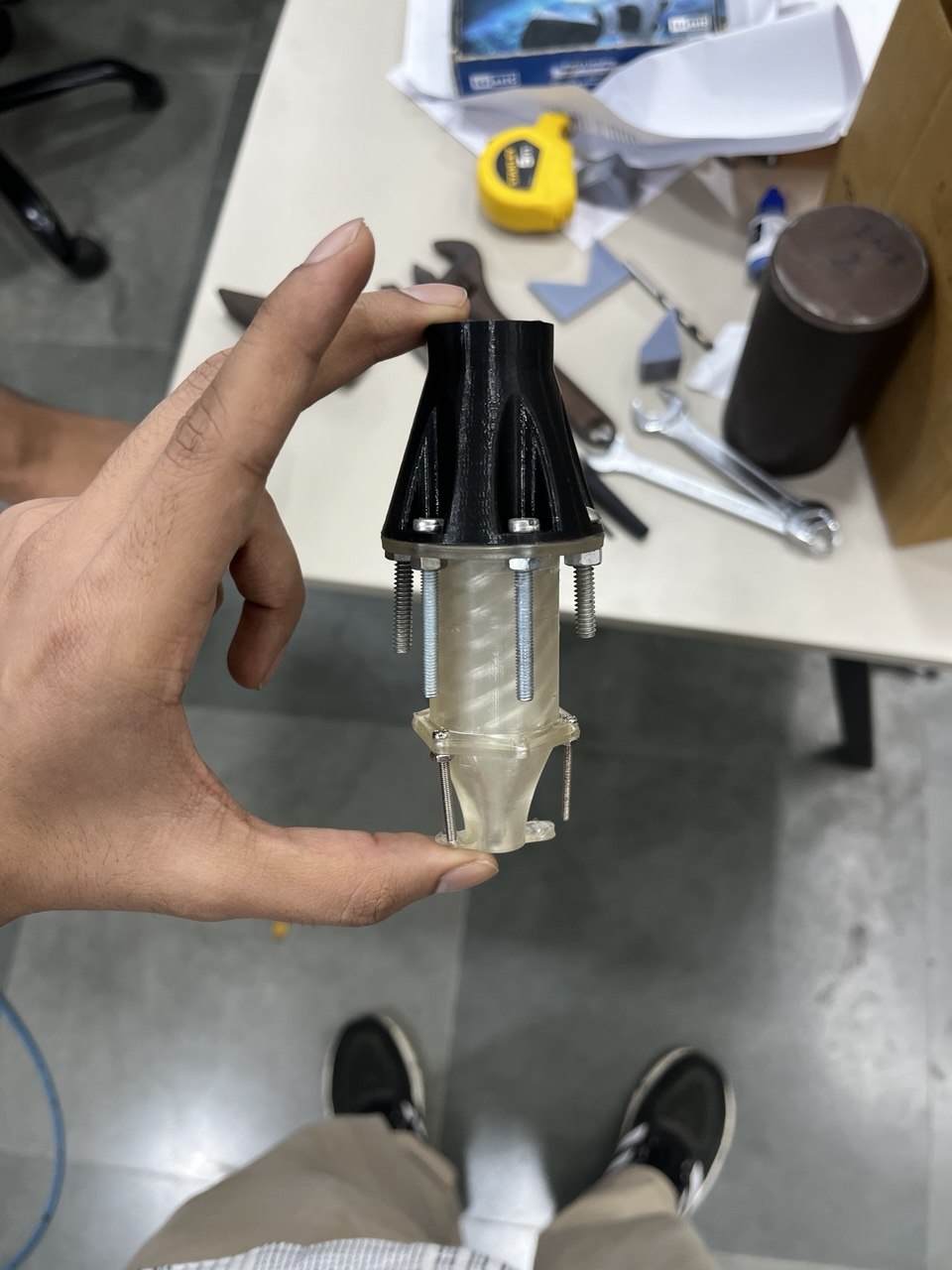 Clear-resin printed prototype of the converging-diverging nozzle, used for geometry validation